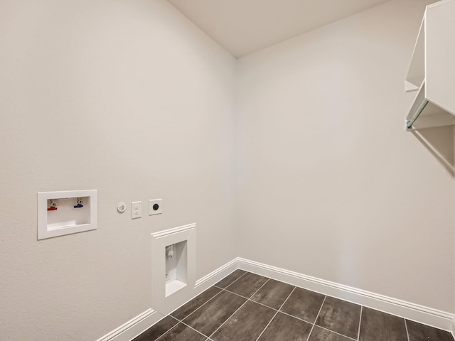 4418 Capstone Rd, Midlothian, TX 76065 - washroom with electric dryer hookup, baseboards, washer hookup, hookup for a gas dryer, and dark tile patterned floors