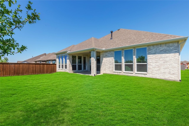 4418 Capstone Rd, Midlothian, TX 76065 - back of property with brick siding and roof with shingles