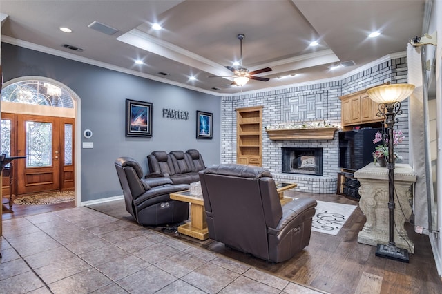 12215 Lake Forest Dr, Azle, TX 76020 - living area featuring a fireplace, ornamental molding, baseboards, ceiling fan, and recessed lighting