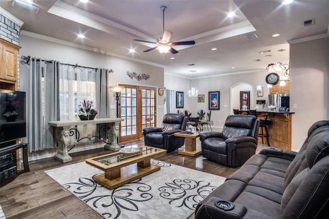 12215 Lake Forest Dr, Azle, TX 76020 - living area with dark wood finished floors, a ceiling fan, recessed lighting, crown molding, and a tray ceiling