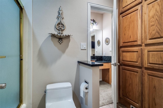 12215 Lake Forest Dr, Azle, TX 76020 - bathroom with toilet, a shower with door, and vanity