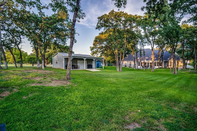 12215 Lake Forest Dr, Azle, TX 76020 - view of grassy yard with a pole building and an outdoor structure