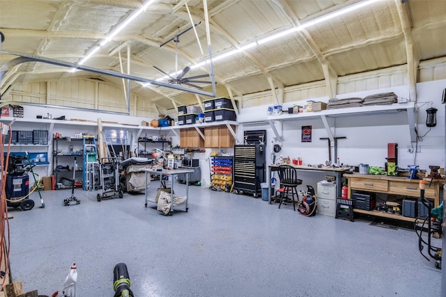 12215 Lake Forest Dr, Azle, TX 76020 - garage featuring a workshop area