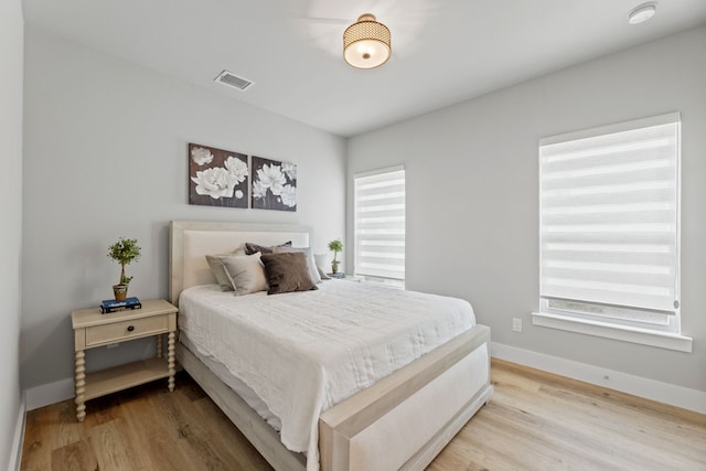 4120 Sandhills Ln, Prosper, TX 75078 - bedroom featuring wood finished floors and baseboards