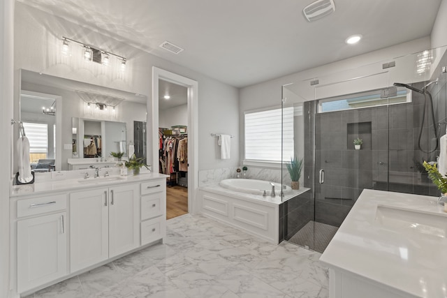 4120 Sandhills Ln, Prosper, TX 75078 - full bathroom featuring a stall shower, healthy amount of natural light, a garden tub, marble look tiles, and recessed lighting