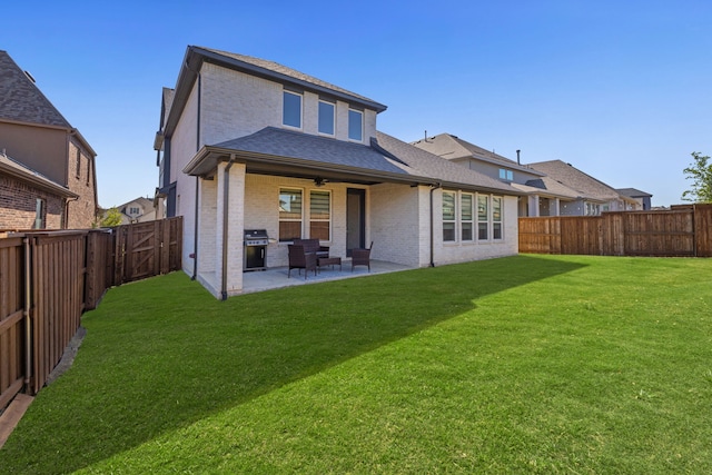 4120 Sandhills Ln, Prosper, TX 75078 - back of house with a patio, brick siding, a shingled roof, and a ceiling fan