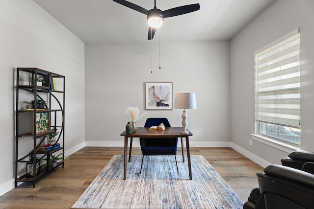4120 Sandhills Ln, Prosper, TX 75078 - office area with a ceiling fan, wood finished floors, and baseboards