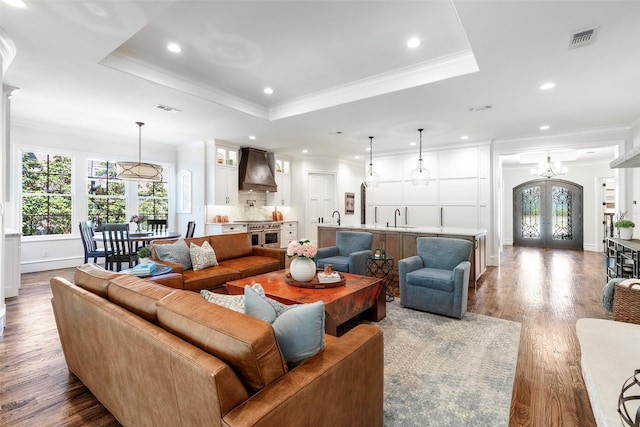 6405 Carmel Falls Ct, Mckinney, TX 75072 - living area with ornamental molding, recessed lighting, and visible vents