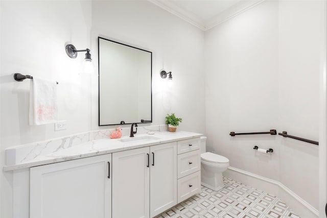 6405 Carmel Falls Ct, Mckinney, TX 75072 - bathroom with crown molding, toilet, baseboards, and vanity
