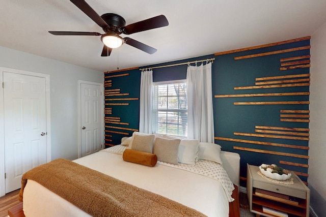 2931 Garapan Dr, Dallas, TX 75224 - bedroom featuring ceiling fan and wood finished floors