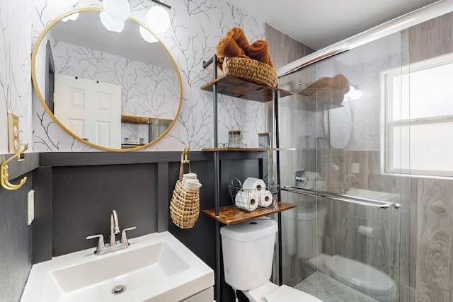 2931 Garapan Dr, Dallas, TX 75224 - bathroom featuring toilet, a shower stall, vanity, and wallpapered walls