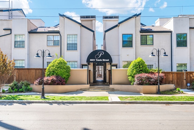 3901 Travis St Unit 121, Dallas, TX 75204 - view of property with brick siding