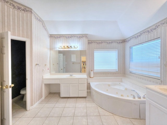 3304 Springbridge Ln, Plano, TX 75025 - full bathroom with wallpapered walls, vanity, a whirlpool tub, tile patterned floors, and toilet