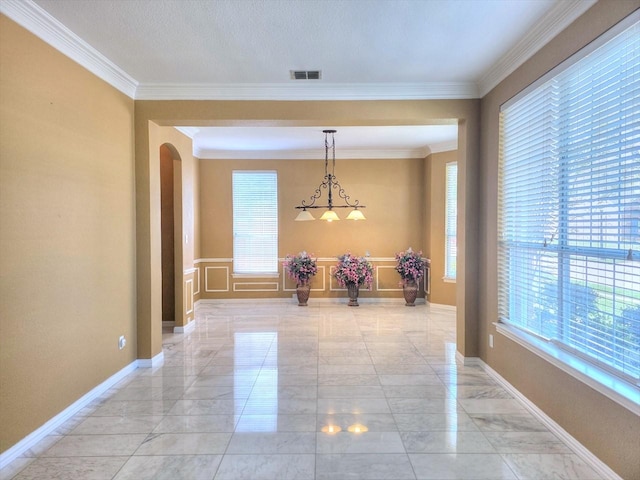 3304 Springbridge Ln, Plano, TX 75025 - hallway with light marble finish flooring, arched walkways, ornamental molding, and baseboards
