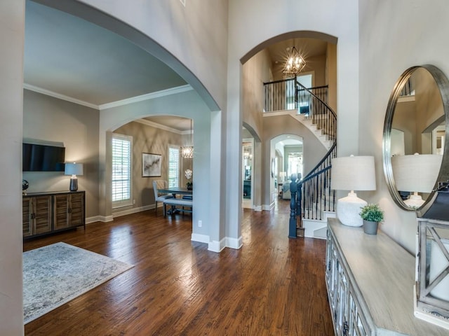 7212 Millard Pond Dr, Mckinney, TX 75071 - entryway with baseboards, ornamental molding, a chandelier, stairway, and wood finished floors