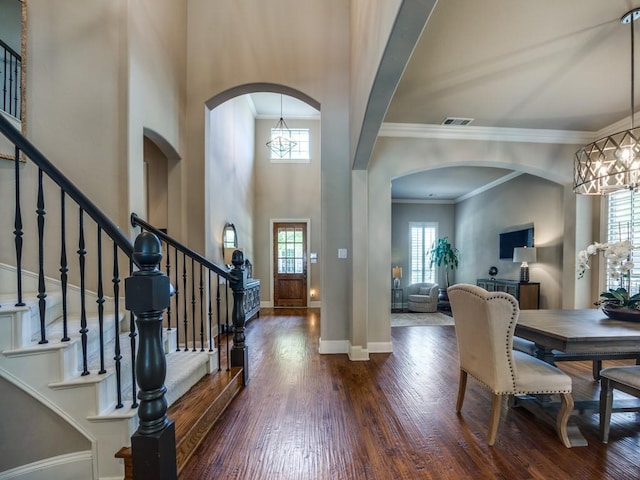 7212 Millard Pond Dr, Mckinney, TX 75071 - foyer featuring a chandelier, a wealth of natural light, visible vents, and dark wood-style flooring