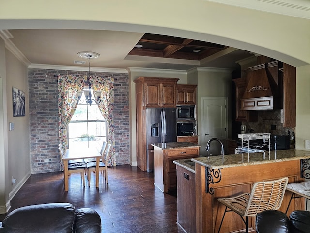 kitchen with fridge with ice dispenser, a sink, black microwave, a peninsula, and crown molding