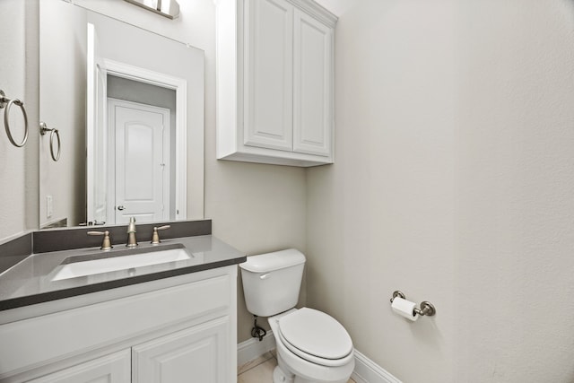 4112 Angelina Dr, Mckinney, TX 75071 - half bath featuring toilet, baseboards, and vanity