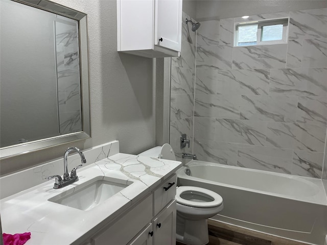 full bath featuring toilet, shower / bath combination, and vanity