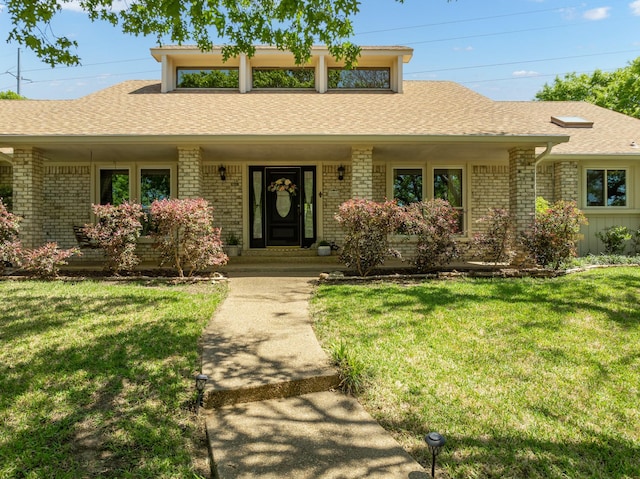 10019 Lost Oak Ridge Dr, Woodway, TX 76712 - ranch-style house featuring brick siding, a porch, roof with shingles, and a front yard