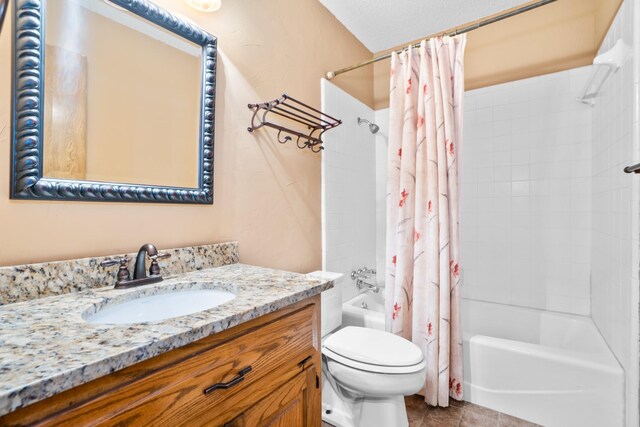 10019 Lost Oak Ridge Dr, Woodway, TX 76712 - full bathroom featuring shower / bath combo, vanity, toilet, and tile patterned floors