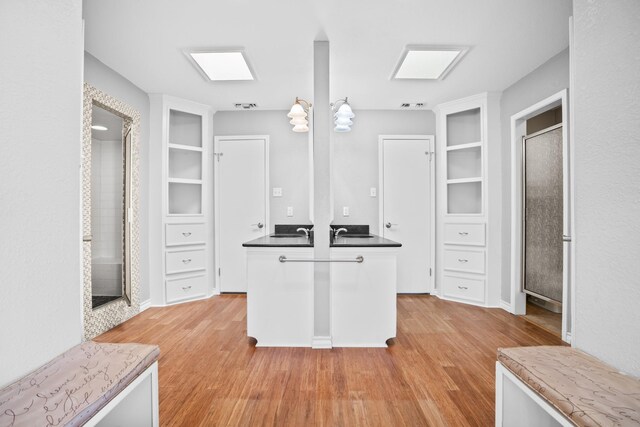 10019 Lost Oak Ridge Dr, Woodway, TX 76712 - walk in closet featuring light wood-style floors