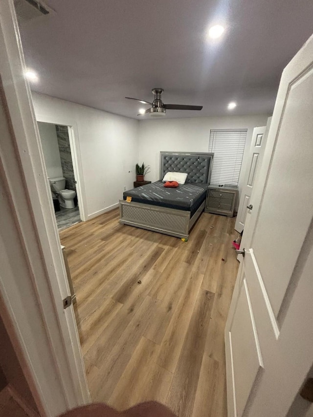 bedroom featuring visible vents, ceiling fan, light wood finished floors, and recessed lighting