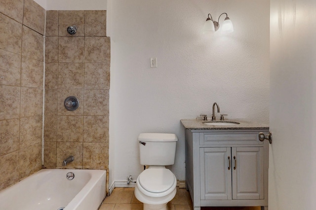 2311 Market Ave, Fort Worth, TX 76164 - bathroom with toilet, bathtub / shower combination, tile patterned flooring, and vanity