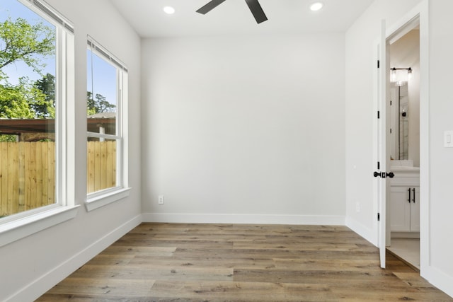 2239 Scotland Dr, Dallas, TX 75216 - empty room with light wood-style floors, ceiling fan, baseboards, and recessed lighting