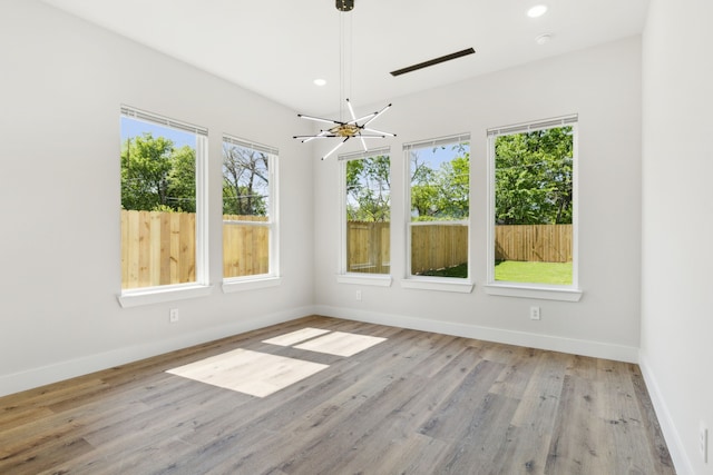 2239 Scotland Dr, Dallas, TX 75216 - unfurnished sunroom featuring visible vents and a chandelier