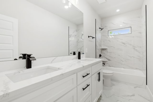 2239 Scotland Dr, Dallas, TX 75216 - bathroom featuring a sink, toilet, double vanity, and marble finish floor