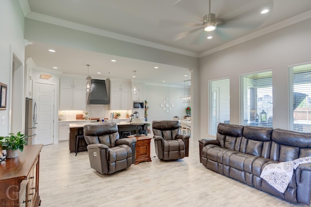 262 Poydras Ave, Bossier City, LA 71111 - living room featuring recessed lighting, light wood-style floors, ornamental molding, and ceiling fan
