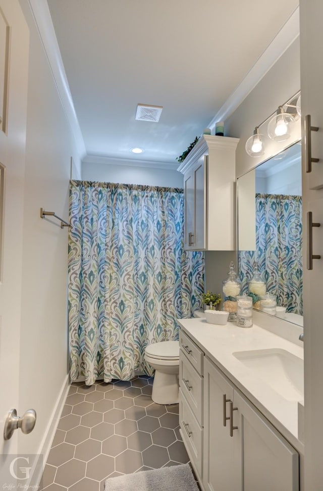 262 Poydras Ave, Bossier City, LA 71111 - full bath featuring vanity, ornamental molding, tile patterned flooring, toilet, and visible vents