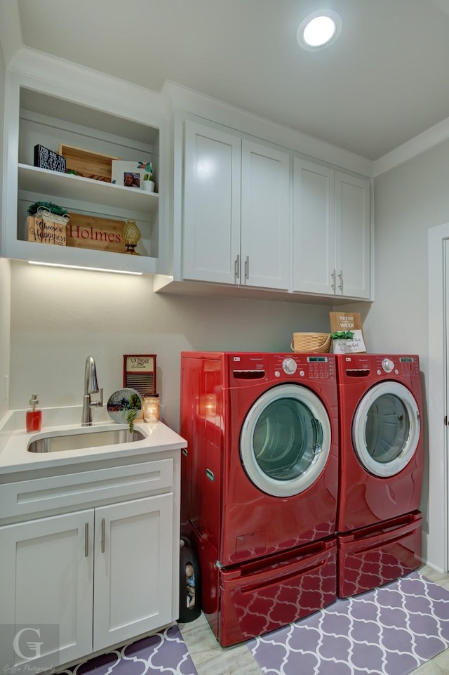 262 Poydras Ave, Bossier City, LA 71111 - washroom with washer and clothes dryer, a sink, and cabinet space
