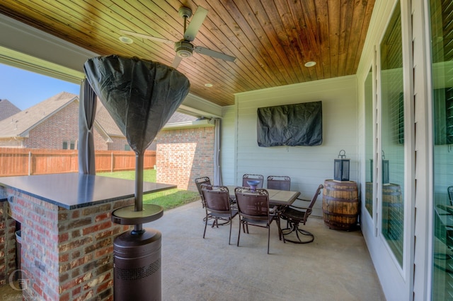 262 Poydras Ave, Bossier City, LA 71111 - view of patio / terrace featuring fence, outdoor dining area, and a ceiling fan
