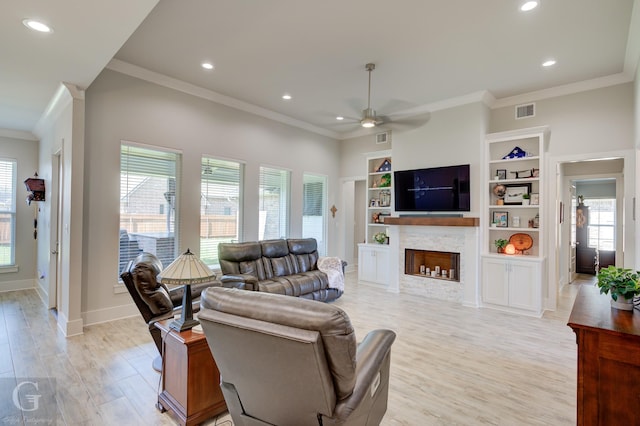262 Poydras Ave, Bossier City, LA 71111 - living area with crown molding, visible vents, ceiling fan, and light wood finished floors