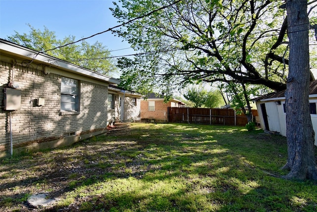 view of yard featuring fence