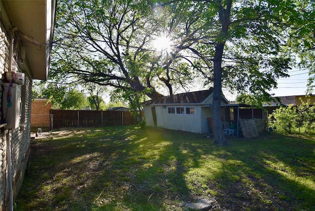 view of yard featuring a fenced backyard