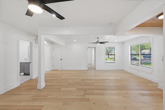 unfurnished living room featuring a ceiling fan, light wood finished floors, baseboards, and recessed lighting