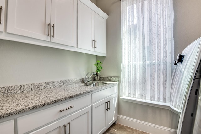 1765 Bramshaw Trl, Farmers Branch, TX 75234 - laundry area with a sink