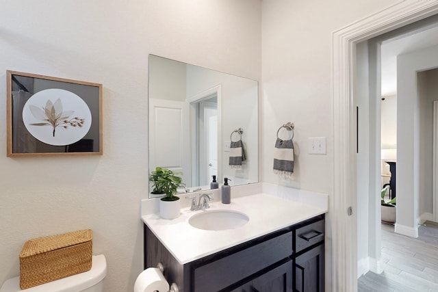 1421 Sage Way, Little Elm, TX 76227 - half bath featuring vanity and wood finished floors