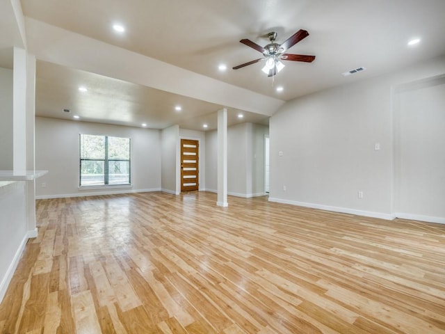 unfurnished room with ceiling fan, light wood-type flooring, visible vents, recessed lighting, and baseboards
