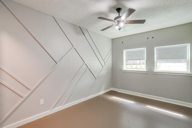 603 S 2nd St, Midlothian, TX 76065 - spare room with a textured ceiling, ceiling fan, and baseboards