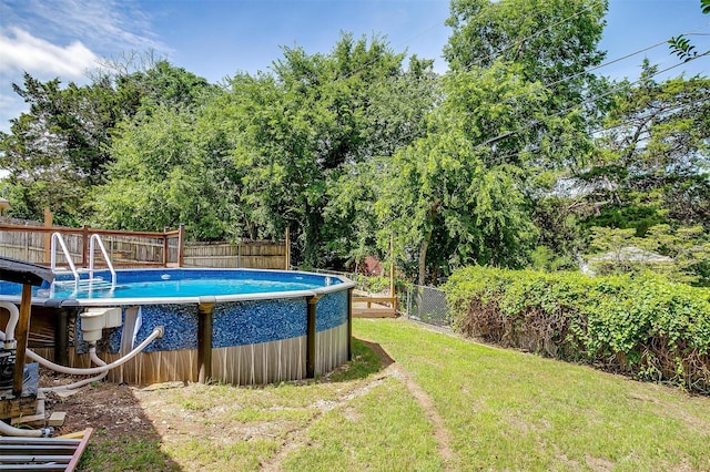 603 S 2nd St, Midlothian, TX 76065 - view of pool with view of wooded area