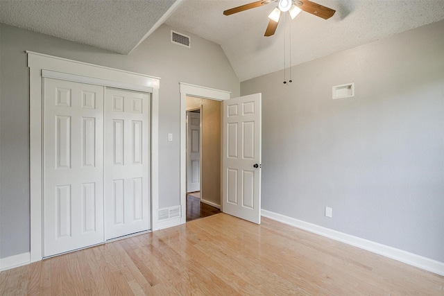 603 S 2nd St, Midlothian, TX 76065 - unfurnished bedroom with wood finished floors, a closet, baseboards, vaulted ceiling, and ceiling fan