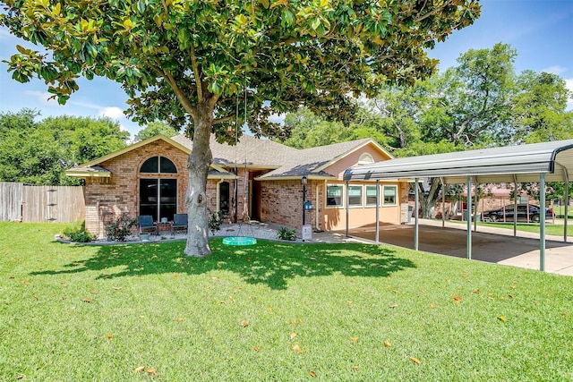 603 S 2nd St, Midlothian, TX 76065 - view of front of house with brick siding, a detached carport, and a shingled roof