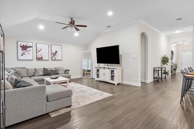 303 W Ohio Ave, Dallas, TX 75224 - living room with ornamental molding, dark wood-style floors, a ceiling fan, visible vents, and arched walkways