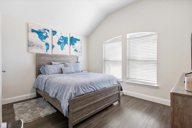 303 W Ohio Ave, Dallas, TX 75224 - bedroom featuring baseboards, wood finished floors, and vaulted ceiling