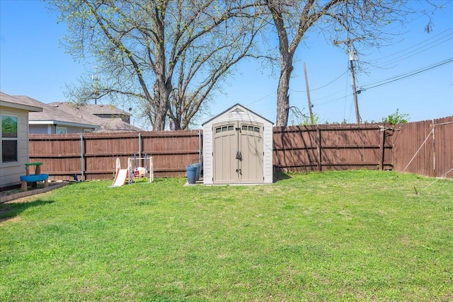 303 W Ohio Ave, Dallas, TX 75224 - view of yard with an outbuilding, a fenced backyard, and a shed