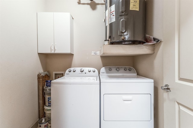 3818 Holland Ave Unit 305, Dallas, TX 75219 - laundry area featuring separate washer and dryer, cabinet space, and electric water heater